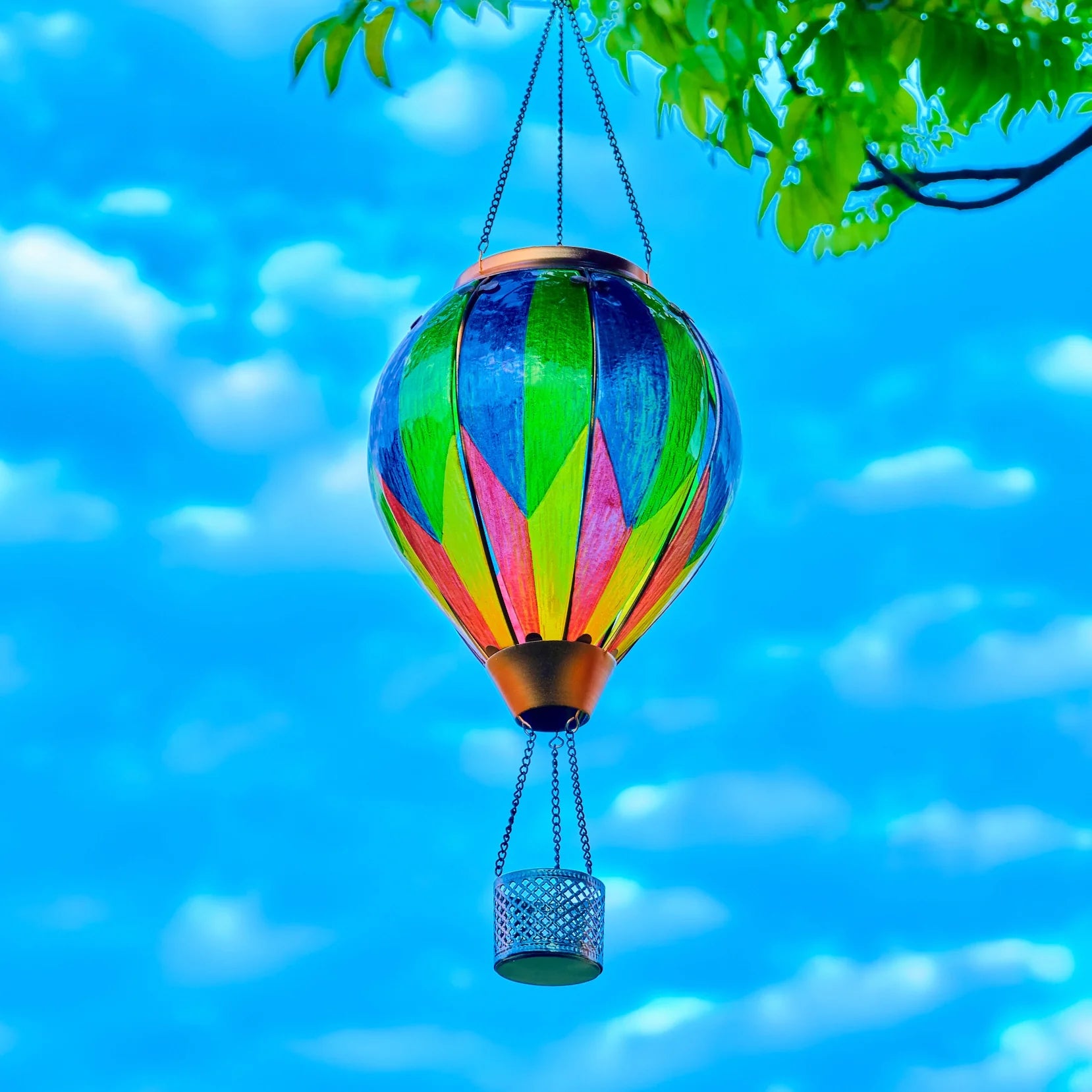 Backyard solar lights featuring a rainbow balloon lantern with gradient hues, great for decorating garden and yard ambiance